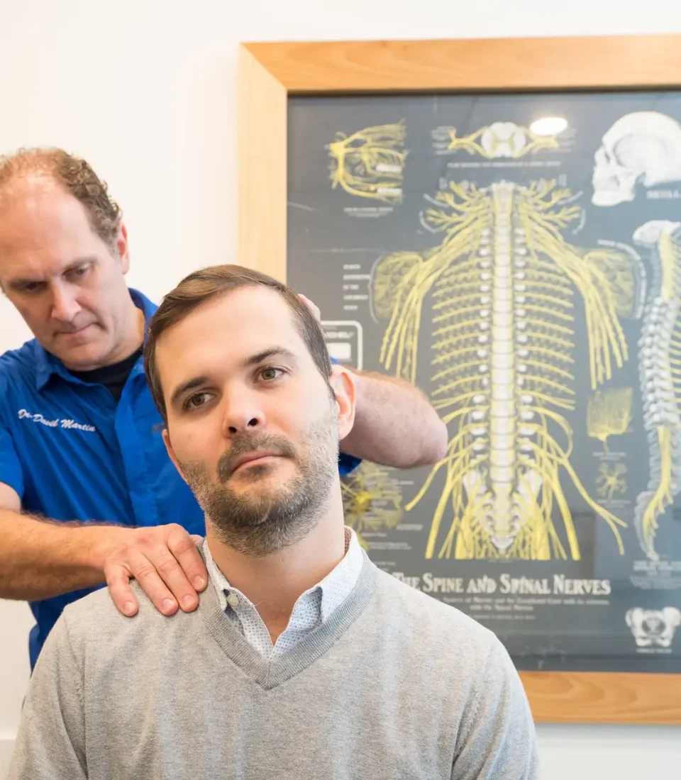 Precision Chiropractic of Durham NC Dr David Martin adjusting Patient Chiropractic Care