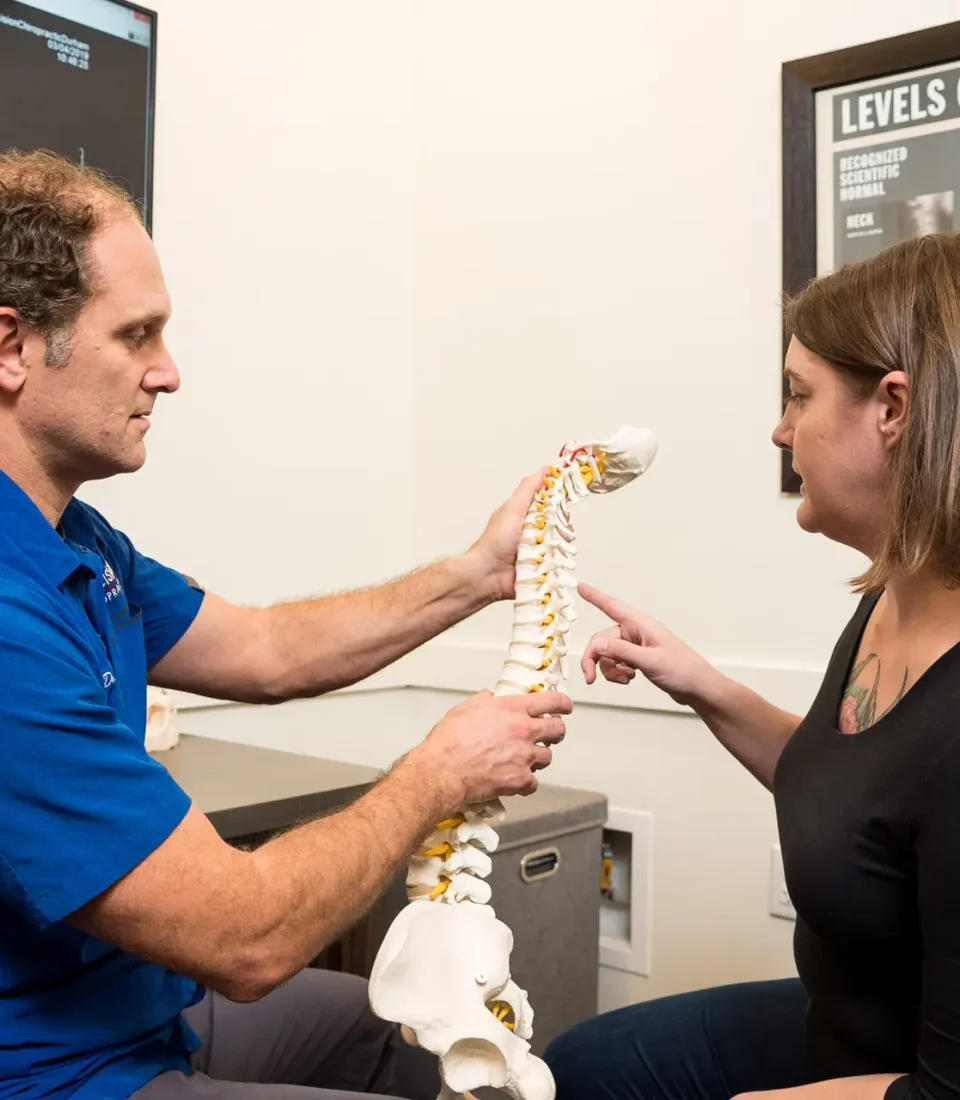 Precision Chiropractic of Durham NC Dr David Martin adjusting Patient Chiropractic Care